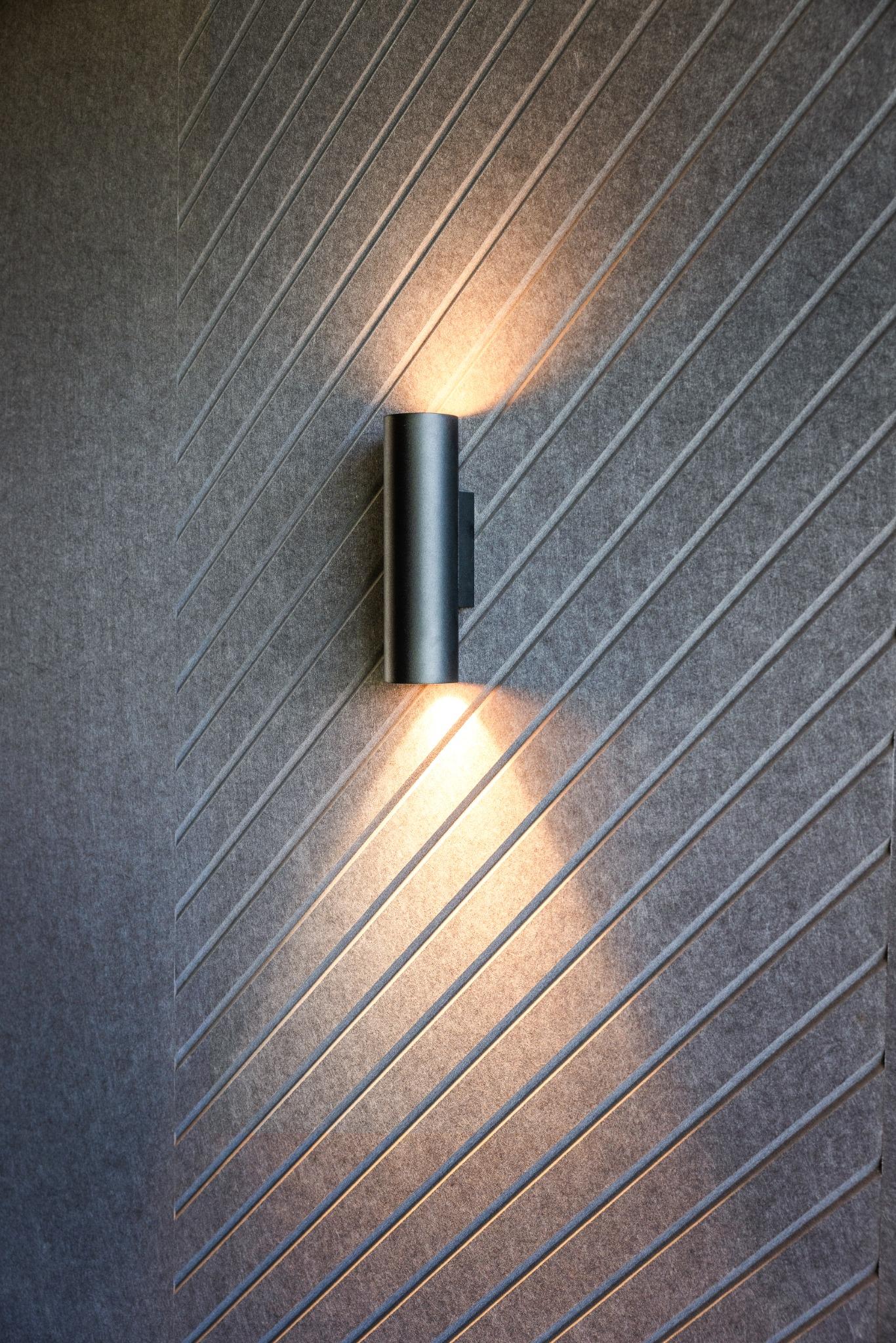 Infinity Group Australia office interior with LPA architectural wall lighting and Woven Image acoustic wall panels, designed by Leithal Designs to enhance acoustic performance and contemporary aesthetics.