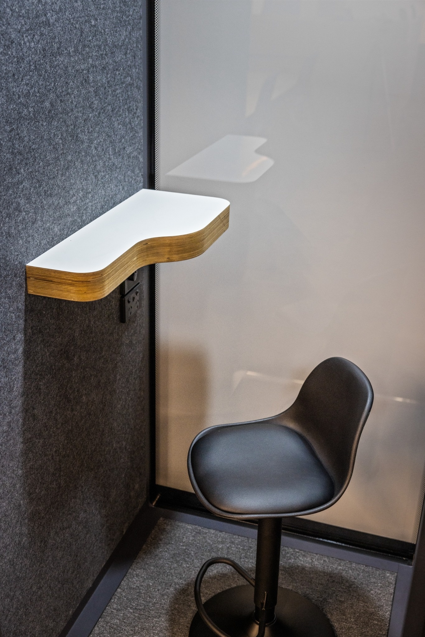 Soundproof phone booths with acoustic treatments and bespoke joinery designed by Leithal Designs for Infinity Group Australia’s Southport office fitout.