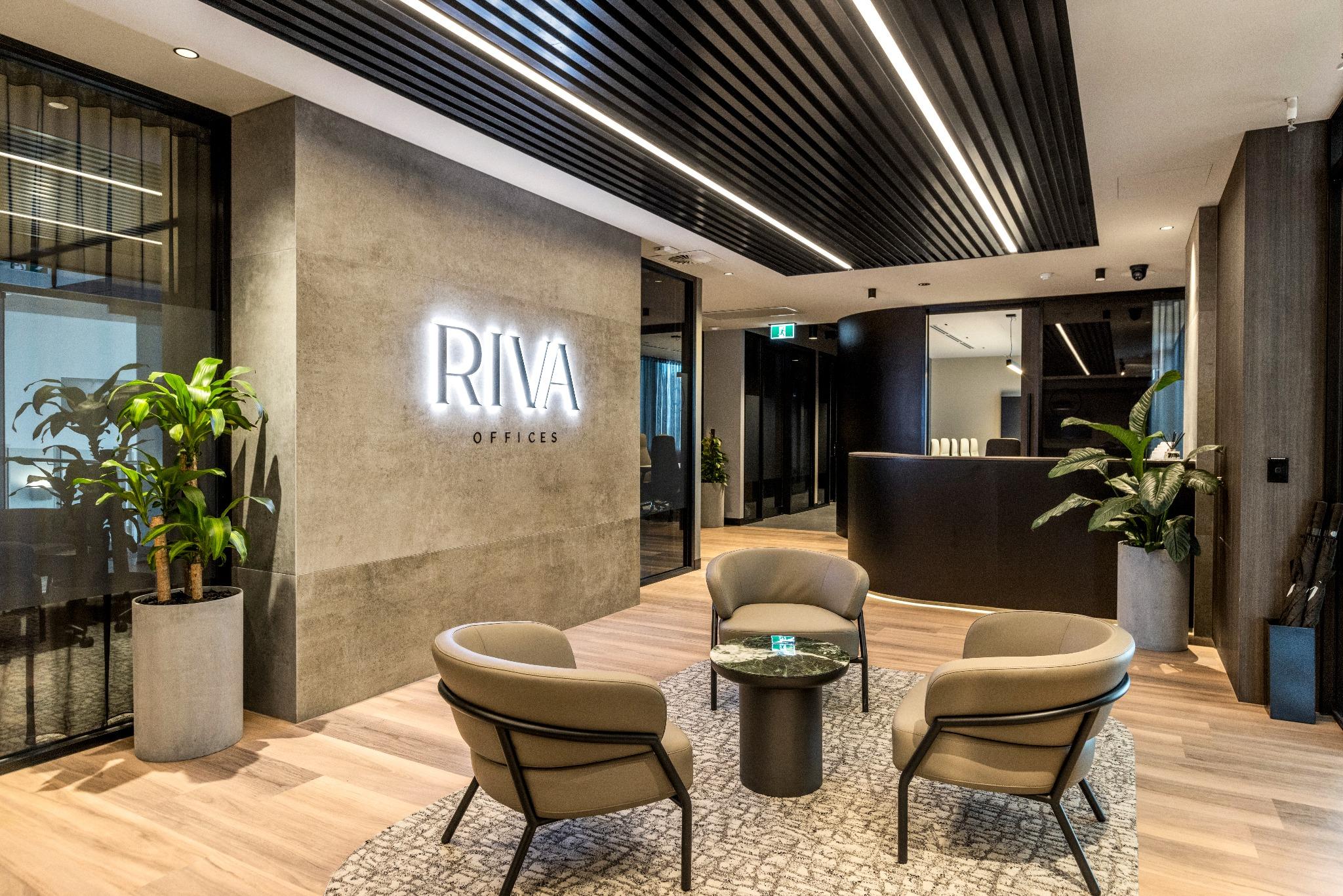 Modern open-plan workspace with ergonomic chairs and acoustic screens – Gold Coast office fitout