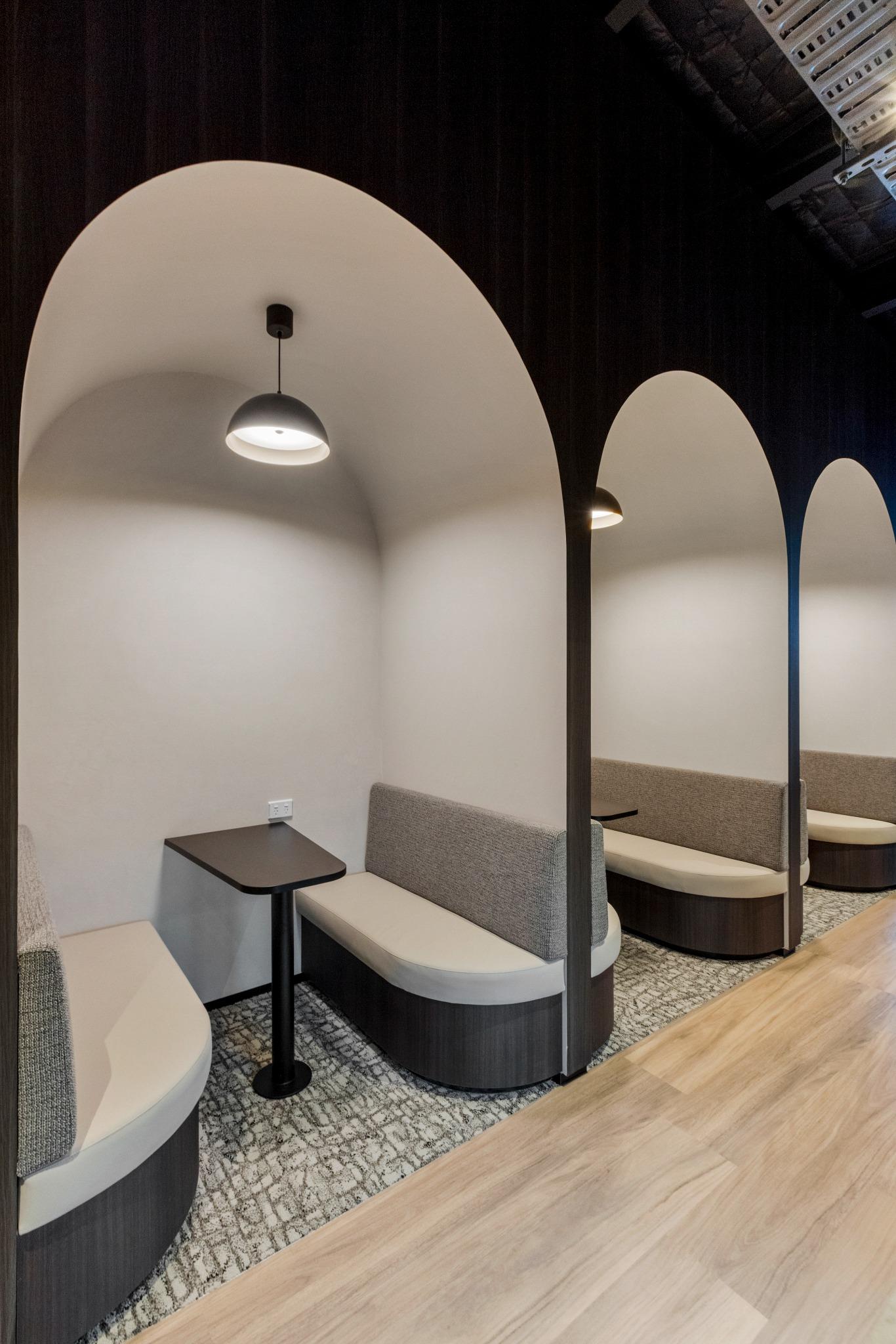 Architectural booth seating with curved detailing – commercial interior design Robina Gold Coast