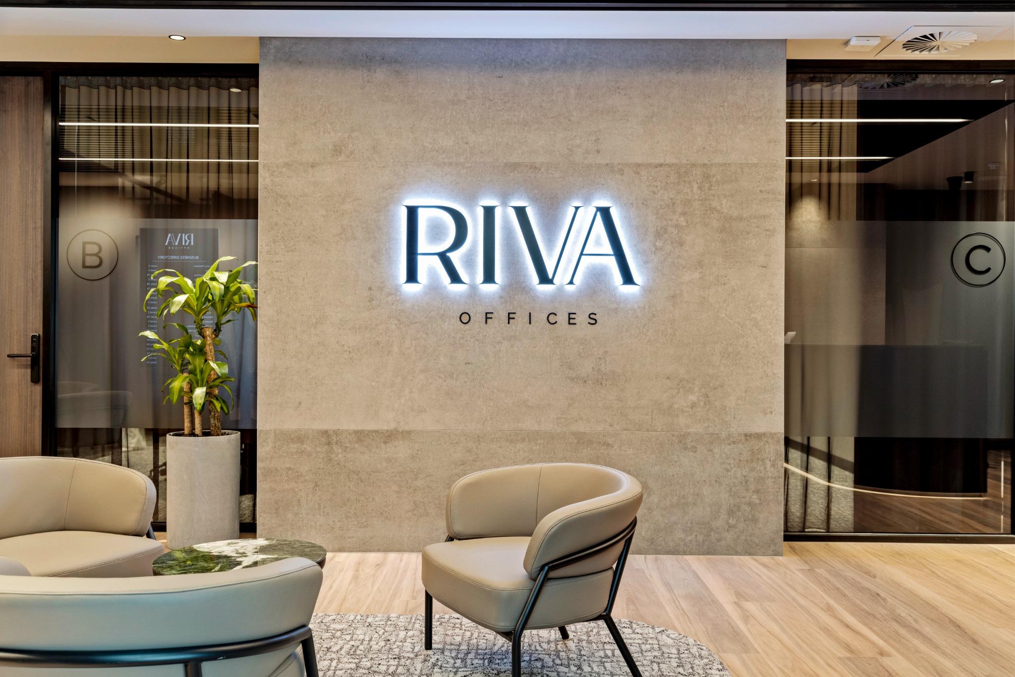 Branded lobby signage for Riva Offices – corporate fitout Gold Coast with hospitality-style entry
